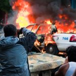 People photographing a fire